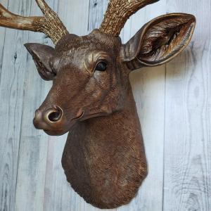 Faux taxidermy deer head painted dark copper with antique gold accents and antique gold antlers.