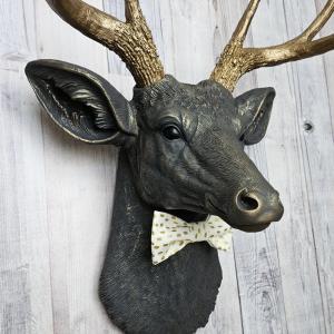 Faux taxidermy deer head, painted slate grey with antique gold accents. 