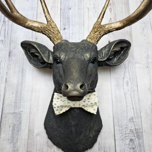 Faux taxidermy deer head, painted slate grey with antique gold accents. 