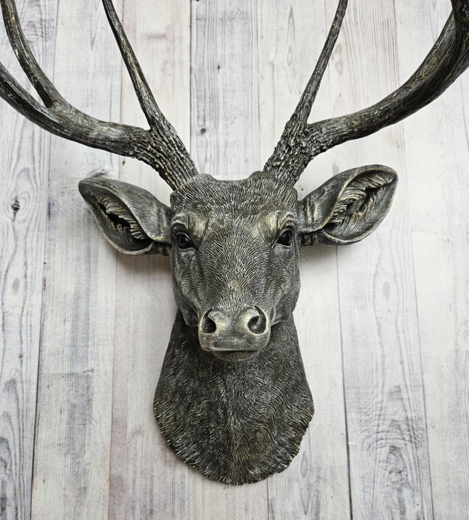 Faux taxidermy deer head, painted chestnut brown with antique white and gold accents. The antlers have been painted the same way.